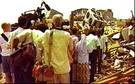 Sudanese villagers, ruins